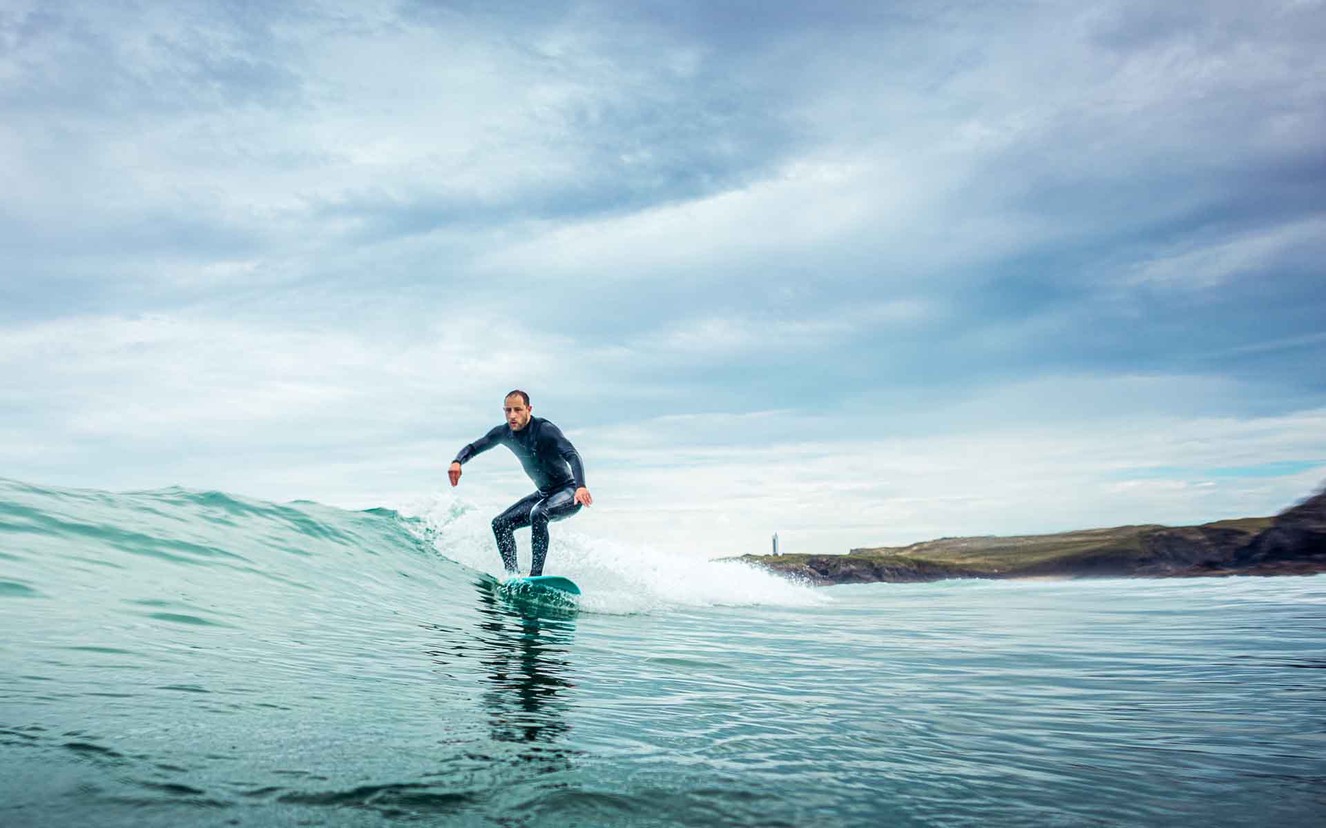 Surf student on frontside wave